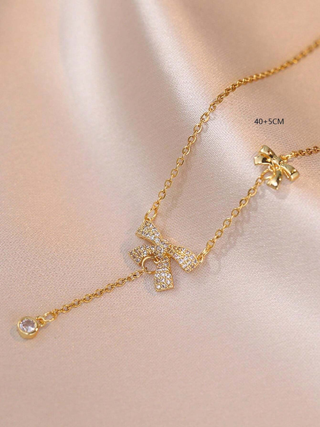 Love Knot Drop Golden Pendant Necklace