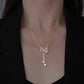 Elegant Bow Cascade Pendant Necklace
