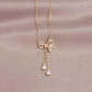 Elegant Bow Cascade Pendant Necklace
