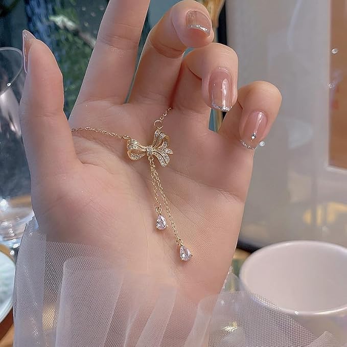 Elegant Bow Cascade Pendant Necklace