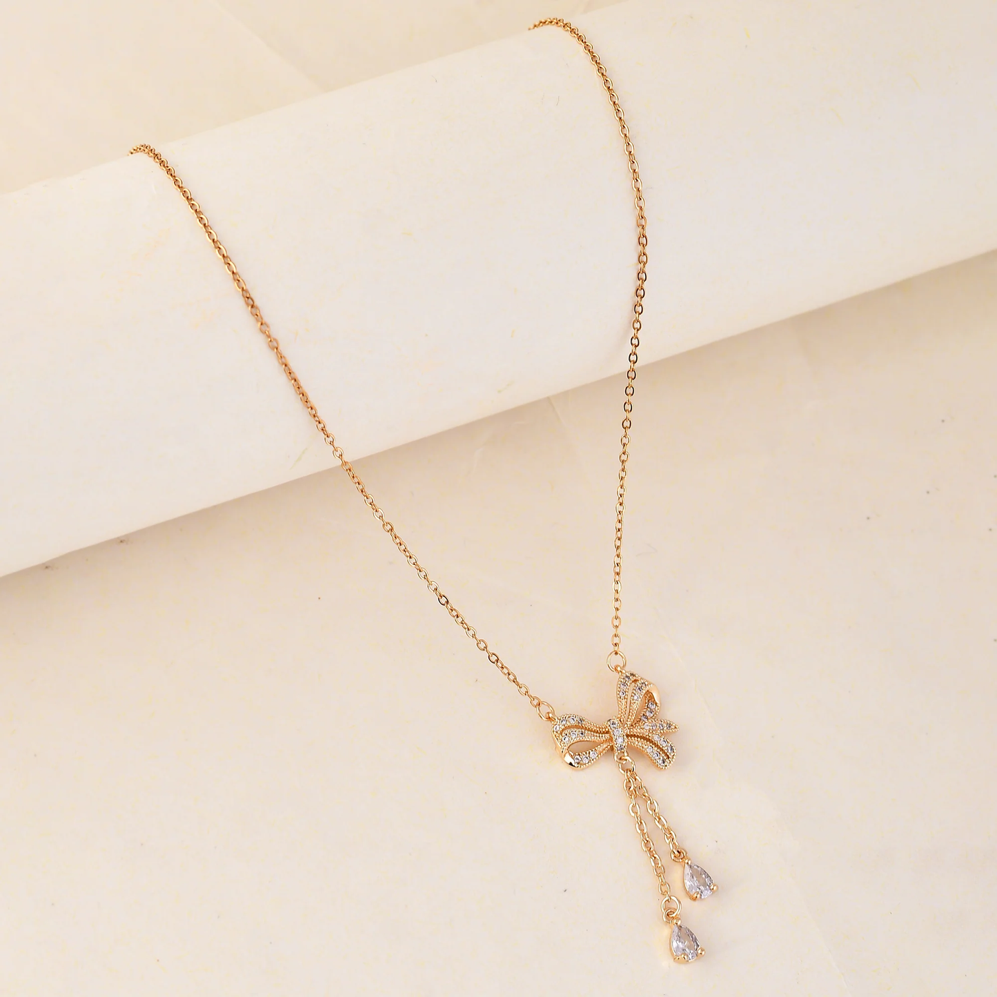 Elegant Bow Cascade Pendant Necklace